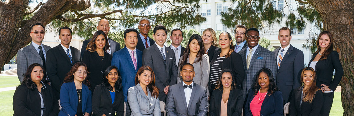 A large group photo of many alumni at an event