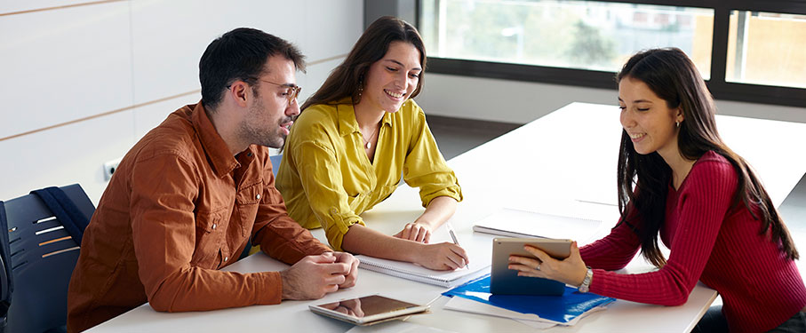 Two students meeting with a career counselor