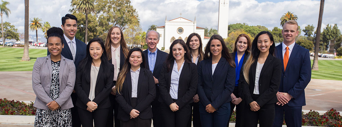 A group of students dressed in professional attire